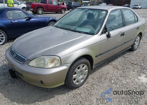 2000 Honda Civic Lx z USA, uszkodzony, nr VIN 1HGEJ6574YL031890